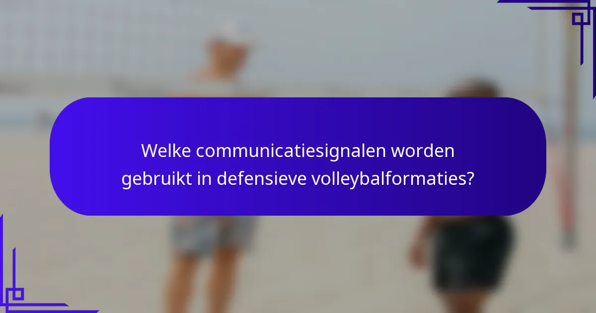 Welke communicatiesignalen worden gebruikt in defensieve volleybalformaties?
